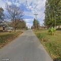Tree fire near structures on Sycamore Street