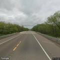 Pedestrian walking in wrong lane on highway