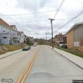 Traffic stop on yellow box truck on Maple Avenue