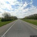 Dead deer blocking left lane on bypass