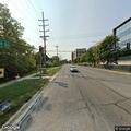 Elderly man falls outside building hitting head