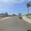 Parked car hit by vehicle on La Mirada Street