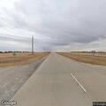 Welfare check on man sitting in highway median