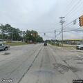 Debris from box truck shatters car window near church
