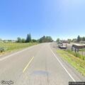 Car crashes through fence on Highway 26