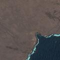 Person with sprained ankle and cuts near green sands