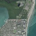 Man with back pain near Crandon Boulevard in Key Biscayne