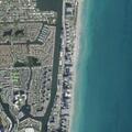 Man swimming near inflatable raft off Hollywood coast