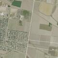 Grass fire from open field burn near intersection