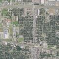 50-year-old woman falls near parking lot by brown Tahoe