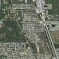 Suspicious person walking near dirt road