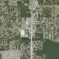 Person experiencing abdominal pain at highway location