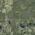 Person experiencing abdominal pain at Lake Cypress Drive