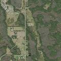Person out of breath near 2009 Cadillac on Old Grade Road