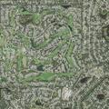 Car hits light pole at Grand Club Drive intersection