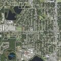 Car crashes into tree, occupants walking around