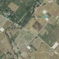 Brush fire near structures on Alfred Blaschke Road