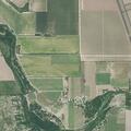 Car leaves road and damages fence in field