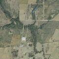 Grass fire smoldering near County Road 158