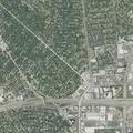 Person with back pain at apartment on Chamberlain Boulevard