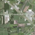 Person lying on side of highway near on-ramp
