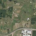 Hay bales on fire on County Road 105 in Giddings
