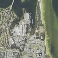 Intoxicated person walking near pier and parking area