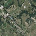 Elderly woman with high blood pressure at farm road