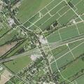 Person with abdominal pain and vomiting near Highway 77