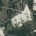 Controlled fire in quarry hole near county line