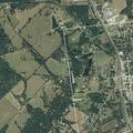 Teenagers spray painting on roadway near Lovelady