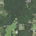 Officer serving warrant on Highway 118
