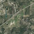 Grass fire near homes and livestock on US 377