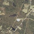 Female patient intermittently unconscious near Mobile Road lot