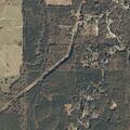 Wood fire near homes on County Road 128