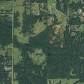 Growing grass fire moving toward nearby homes