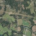 Grass fire on fence line near Holt Street