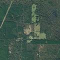 Grass fire near home and gas tank on County Road 1775