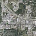 Juveniles hitting golf balls at cars near Main Street