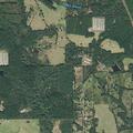 Grass fire possibly spreading under house