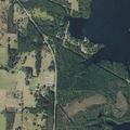 Trees partially blocking County Road 4765 and 4865