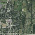 Woman with abdominal pain reported near Orange Street in Farmersville