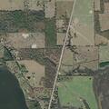 Elderly woman found unconscious but breathing at private road
