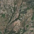 Person experiencing chest pain near Vía De Lago