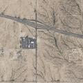 Group fight at Tonopah gas station, one holding pickaxe