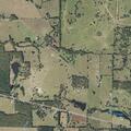 Hay baler and grass fire near county road (number withheld)