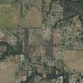 Grass fire near structure on Preston Road in Sherman