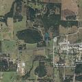 Grass fire in pasture near barn in Gainesville