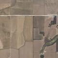 Field and compound fire near house in Drew