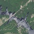 Small brush fire with live power lines arcing